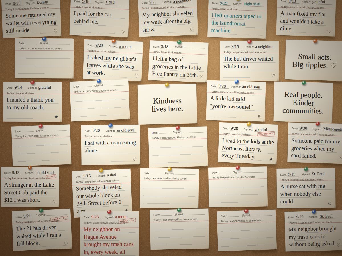 The Wall: handwritten index cards of anonymous kindness pinned to a corkboard